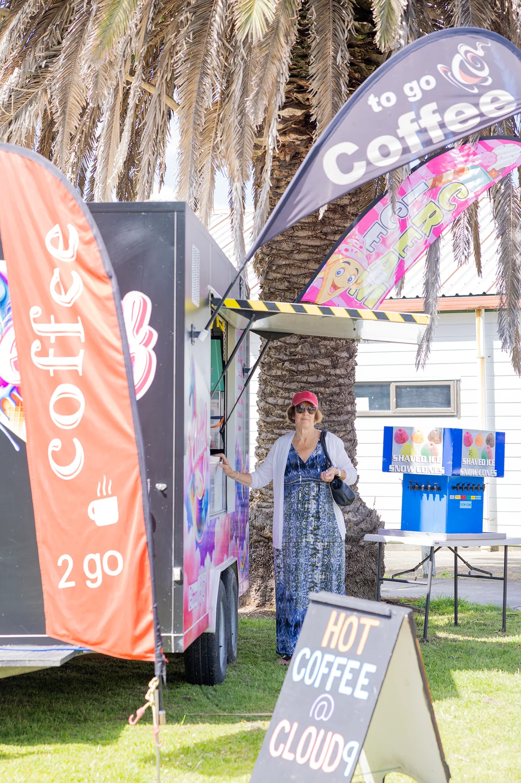 A coffee vendor outside the market