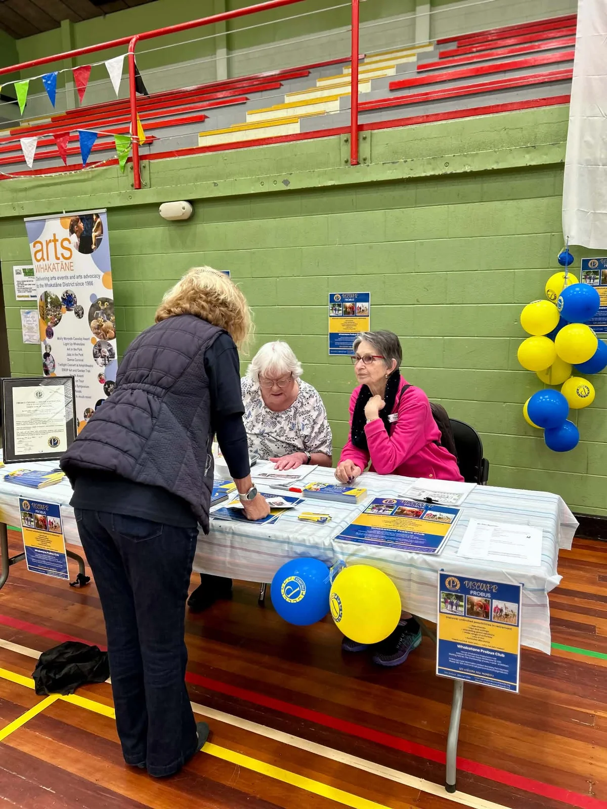 A conversation at a community information stand